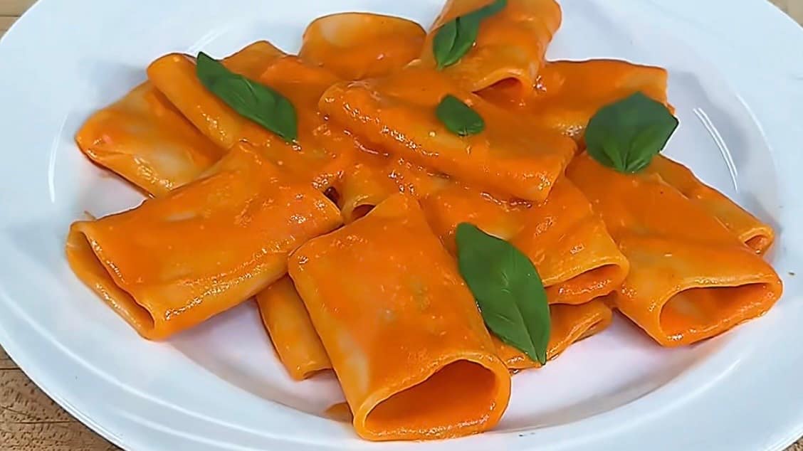 Paccheri alla Vittorio tossed in a silky tomato sauce with basil and Parmigiano Reggiano.