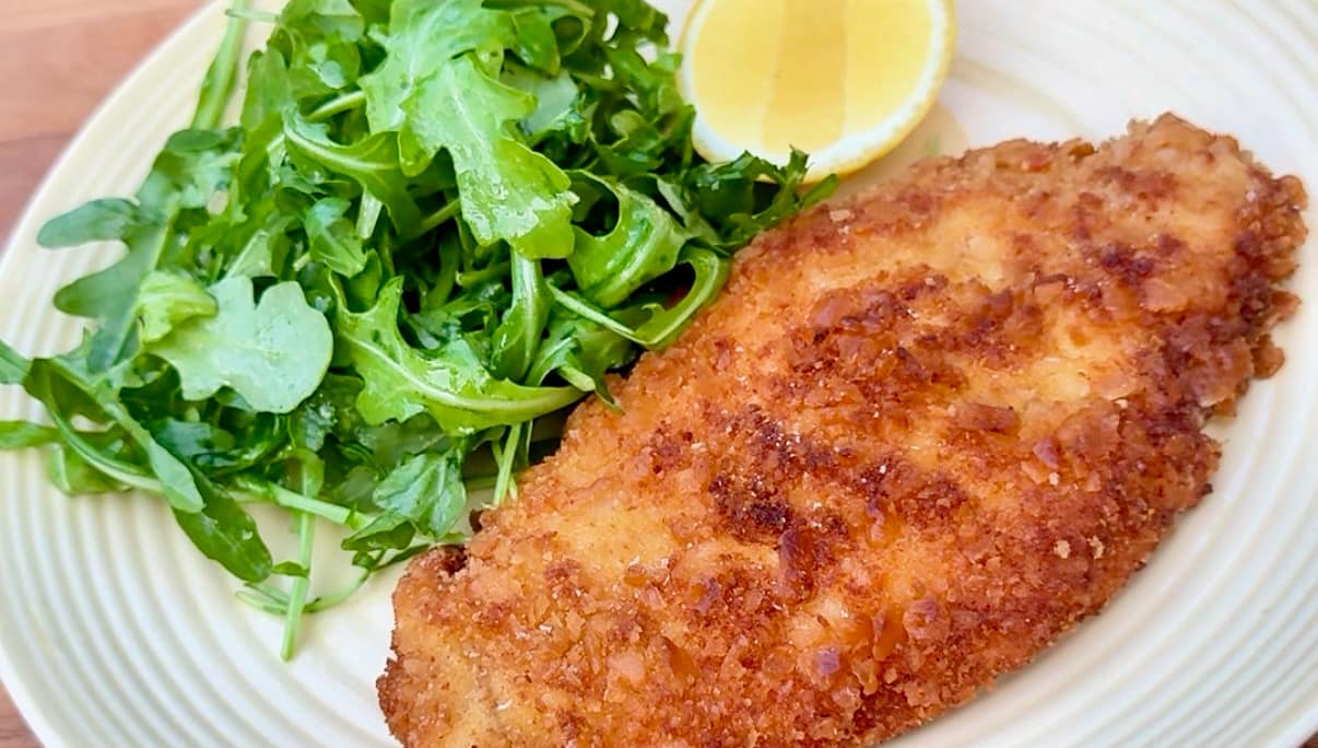 chicken milanese with arugula salad and lemon