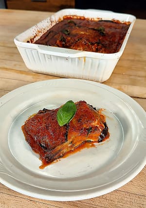 Eggplant parmigiana baked with tomato sauce mozzarella and Parmigiano