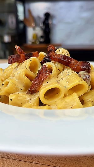 mezzi rigatoni carbonara with guanciale pecorino and black pepper