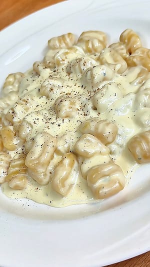 gnocchi ai quattro formaggi made with asiago, fontina, gorgonzola dolce and parmigiano reggiano