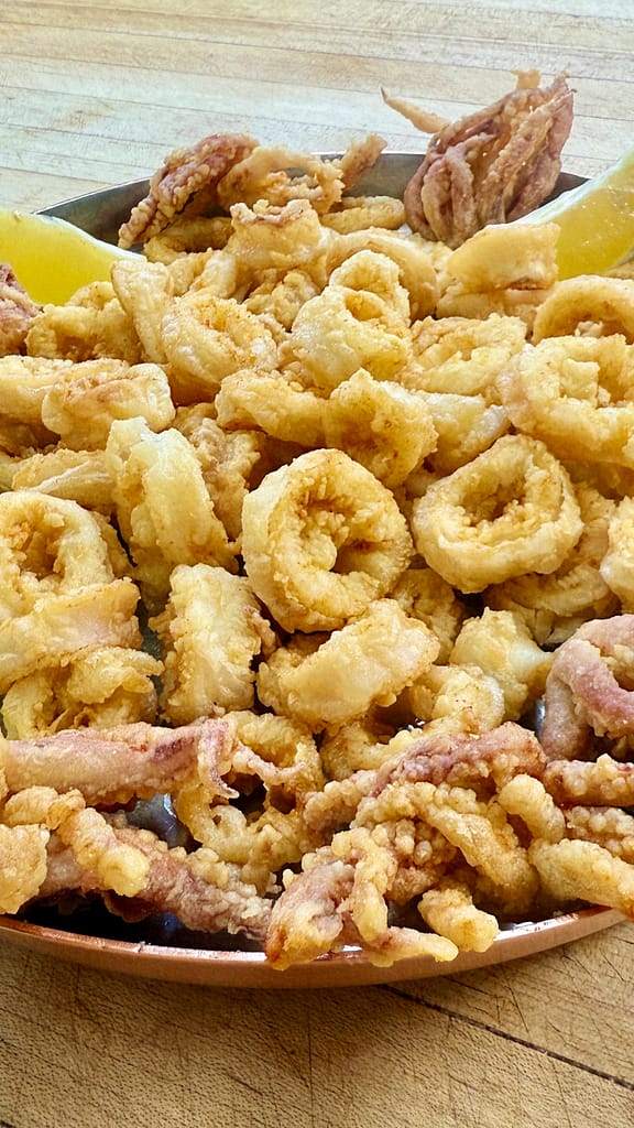 Classic Italian-American fried calamari with lemon