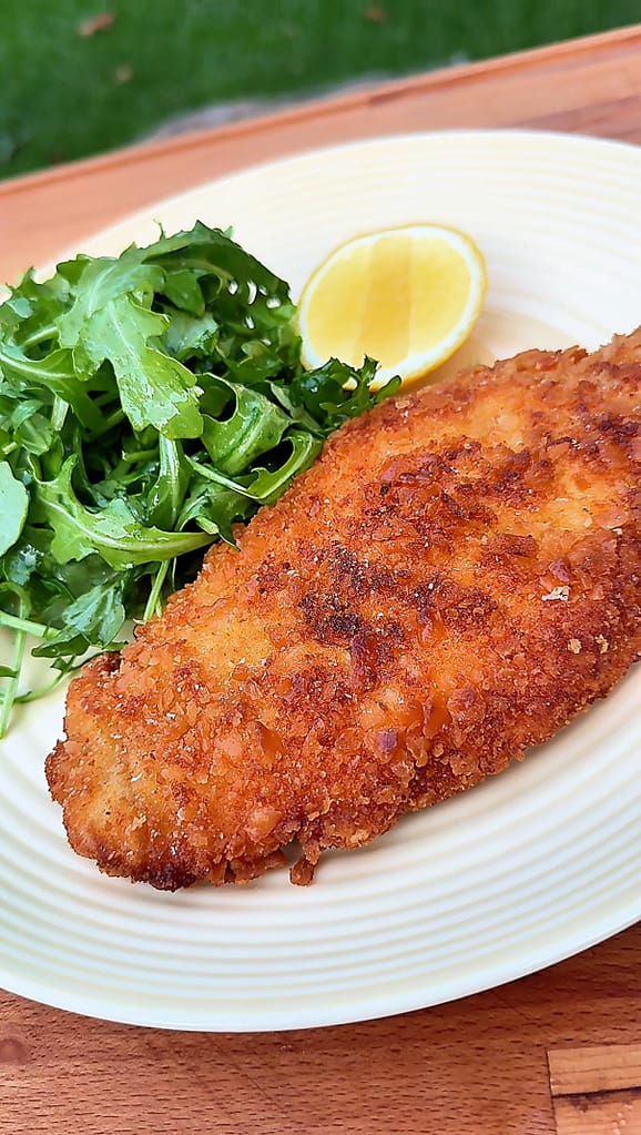 chicken milanese with arugula salad and lemon