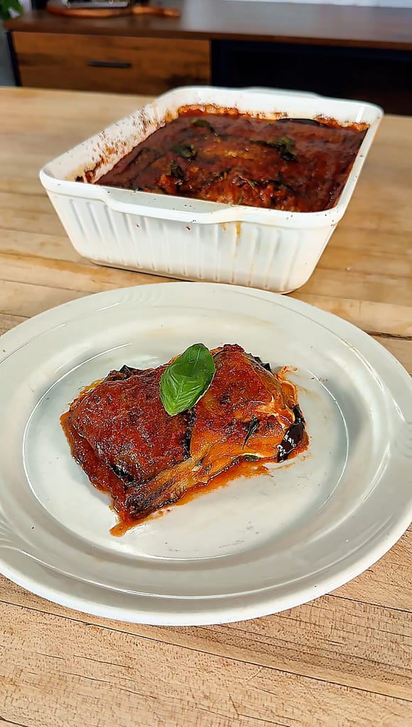 Eggplant parmigiana baked with tomato sauce mozzarella and Parmigiano
