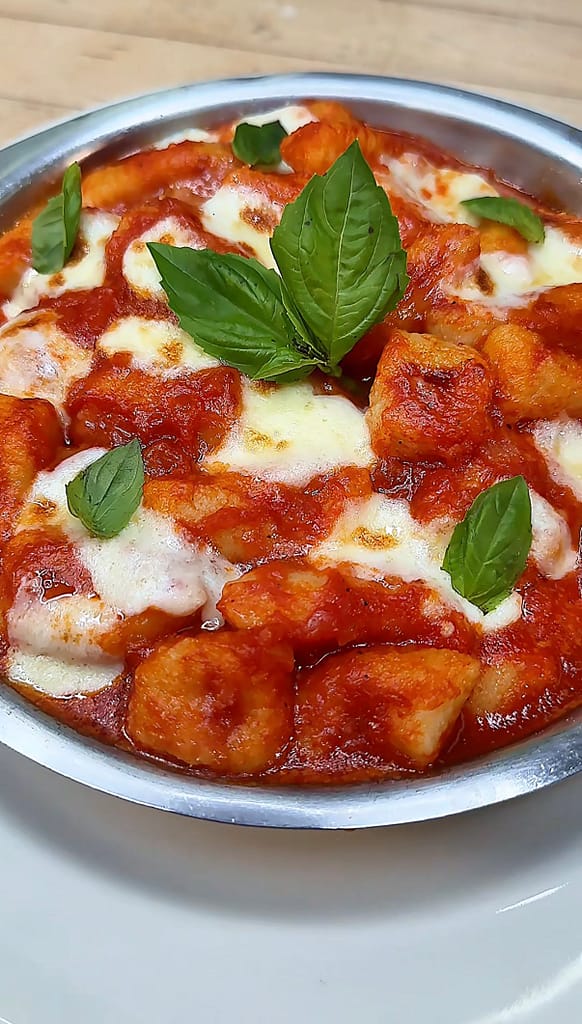 gnocchi alla sorrentina baked with tomato sauce mozzarella and basil