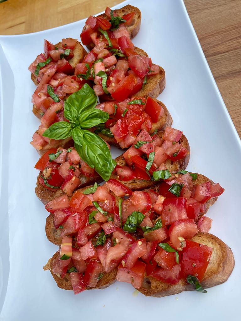 Italian bruschetta with tomatoes basil and toasted bread